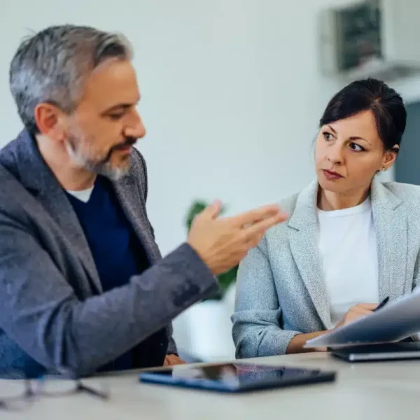 professional-discussion-between-colleagues-in-a-mo-2026-01-09-11-58-21-utc